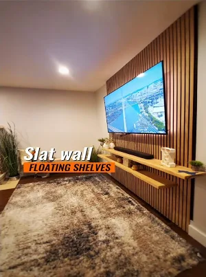A modern media wall with vertical wood slats and integrated lighting.