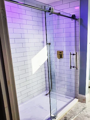 A renovated bathroom featuring custom cabinetry and functional elegance.