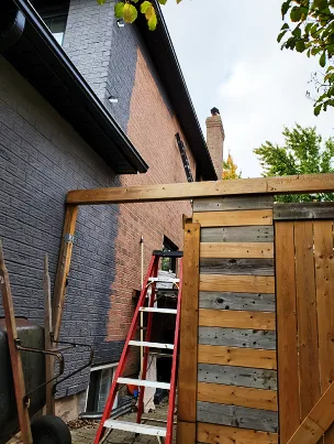 Close-up of professionally stained brickwork, showing clean lines and even color.