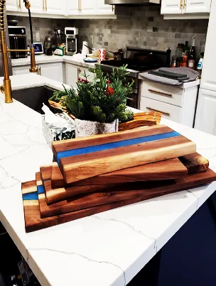 A solid Black Walnut serving board, presented as a piece of functional art for the home.