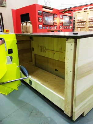 A custom-built, collapsible wooden cart for a mobile business.