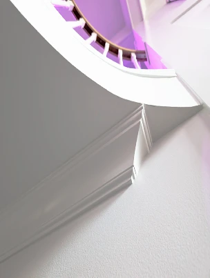 Elegant white crown moulding installed where the wall meets the ceiling.