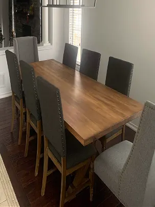 A modern, thick-slab Wormy Maple table.