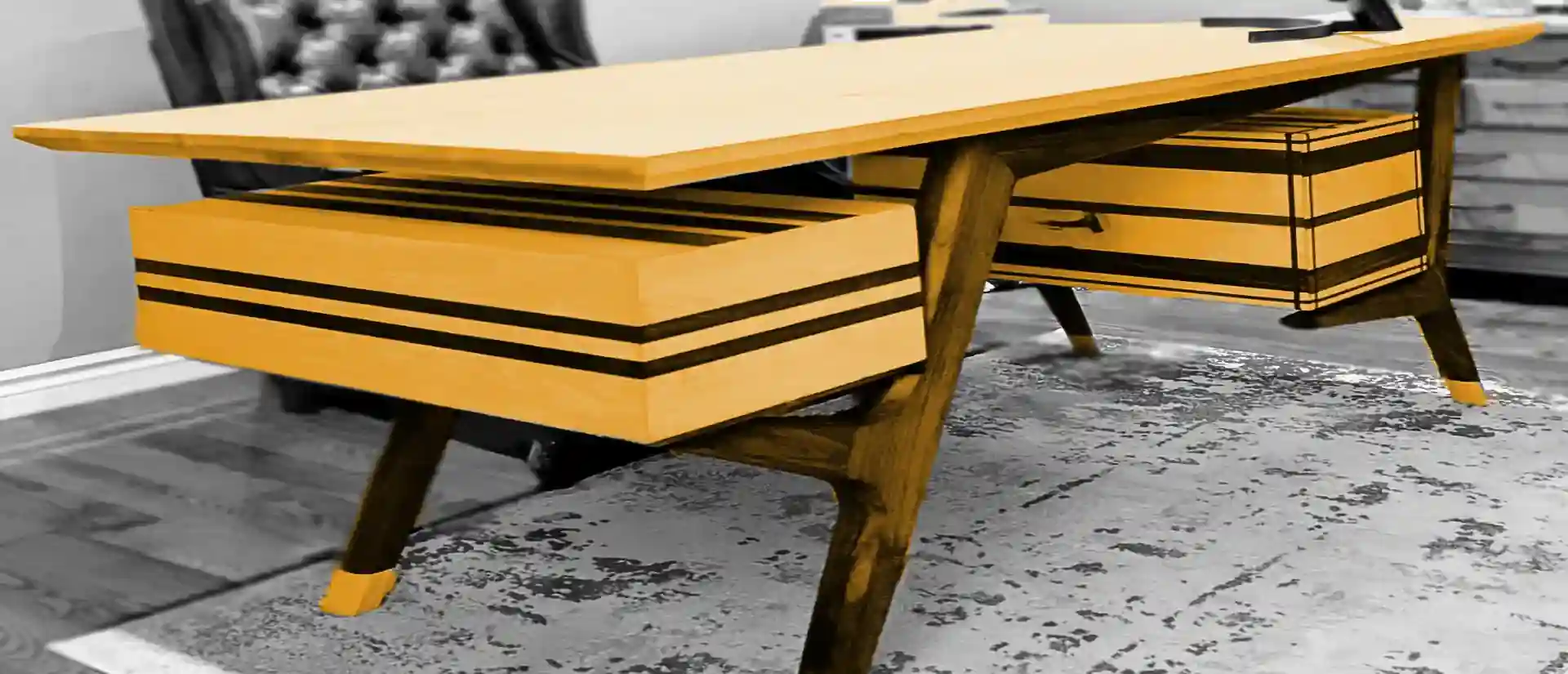 Modern wood desk with purple heart inlays within drawers