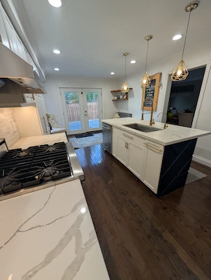 A modern and functional custom geometric kitchen island.